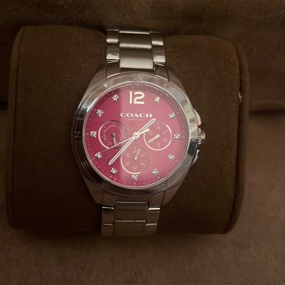 Womens coach silver watch with pink face , brand new no tags